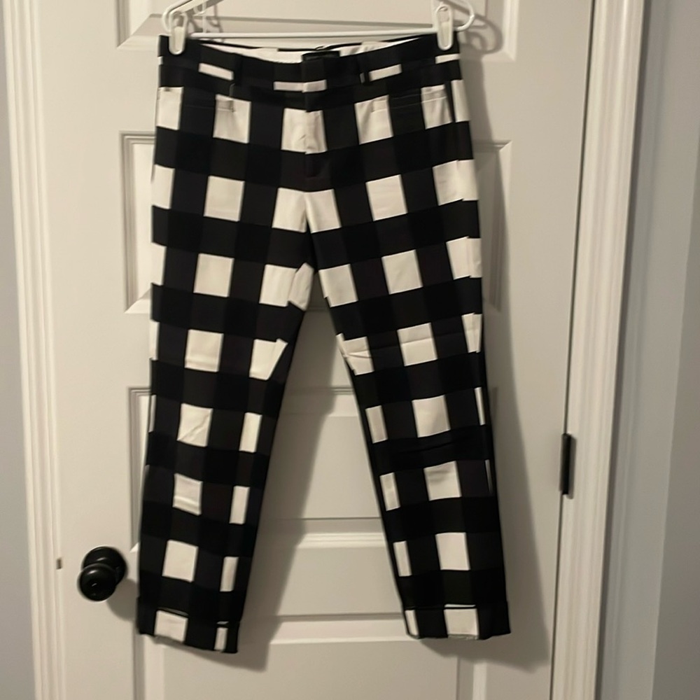 Black and white large check ankle pants. Front zip and button